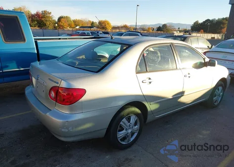 2004 Toyota Corolla Le z USA, uszkodzony, nr VIN JTDBR32E142021359